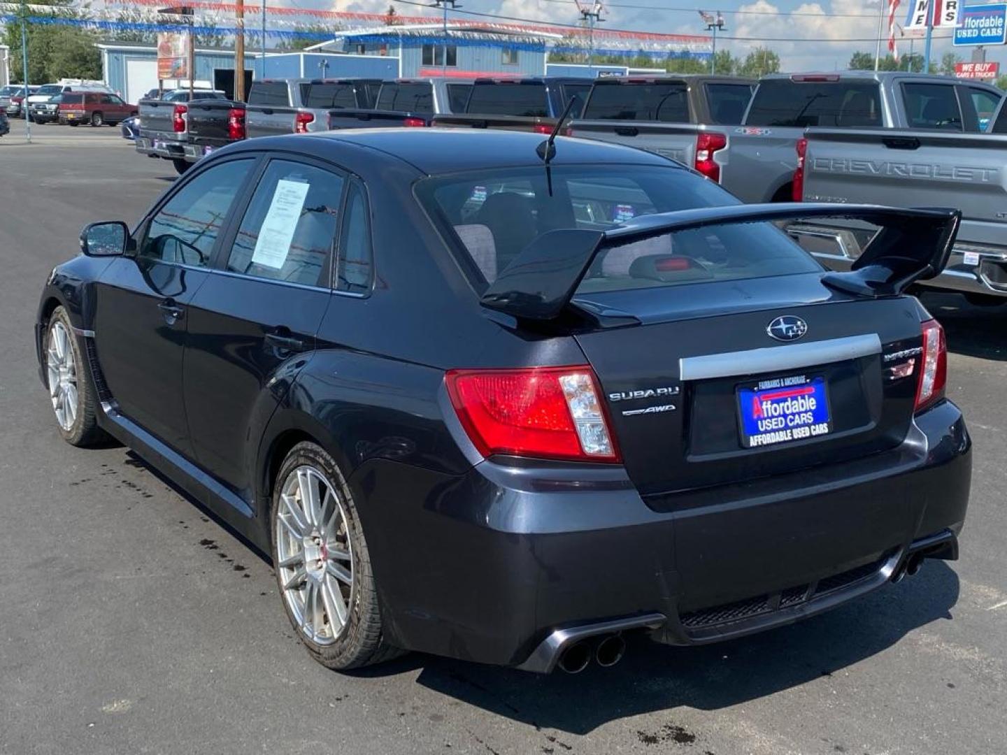 2011 BLACK SUBARU IMPREZA WRX STI (JF1GV8J61BL) with an 2.5L engine, Automatic transmission, located at 2525 S. Cushman, Fairbanks, AK, 99701, (907) 452-5707, 64.824036, -147.712311 - Photo#3