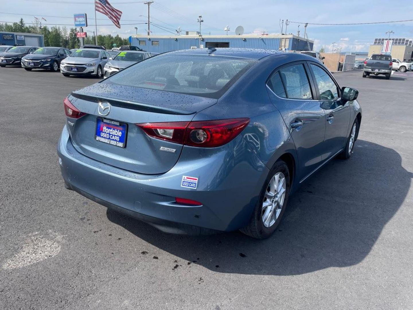 2016 BLUE MAZDA 3 GRAND TOURING (JM1BM1X77G1) with an 2.0L engine, Automatic transmission, located at 2525 S. Cushman, Fairbanks, AK, 99701, (907) 452-5707, 64.824036, -147.712311 - Photo#3