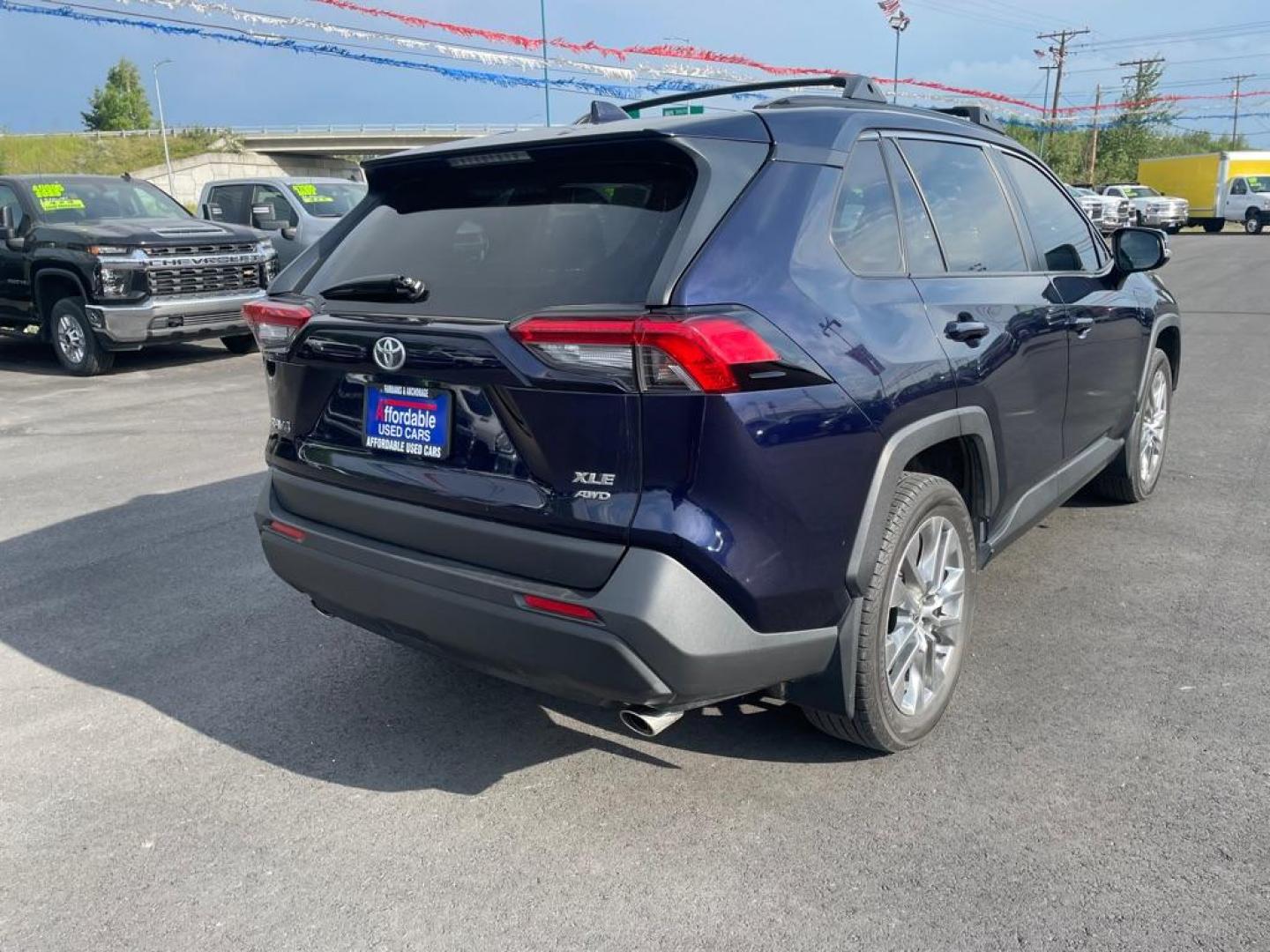 2020 BLUE TOYOTA RAV4 XLE PREMIUM (JTMA1RFV9LD) with an 2.5L engine, Automatic transmission, located at 2525 S. Cushman, Fairbanks, AK, 99701, (907) 452-5707, 64.824036, -147.712311 - Photo#3