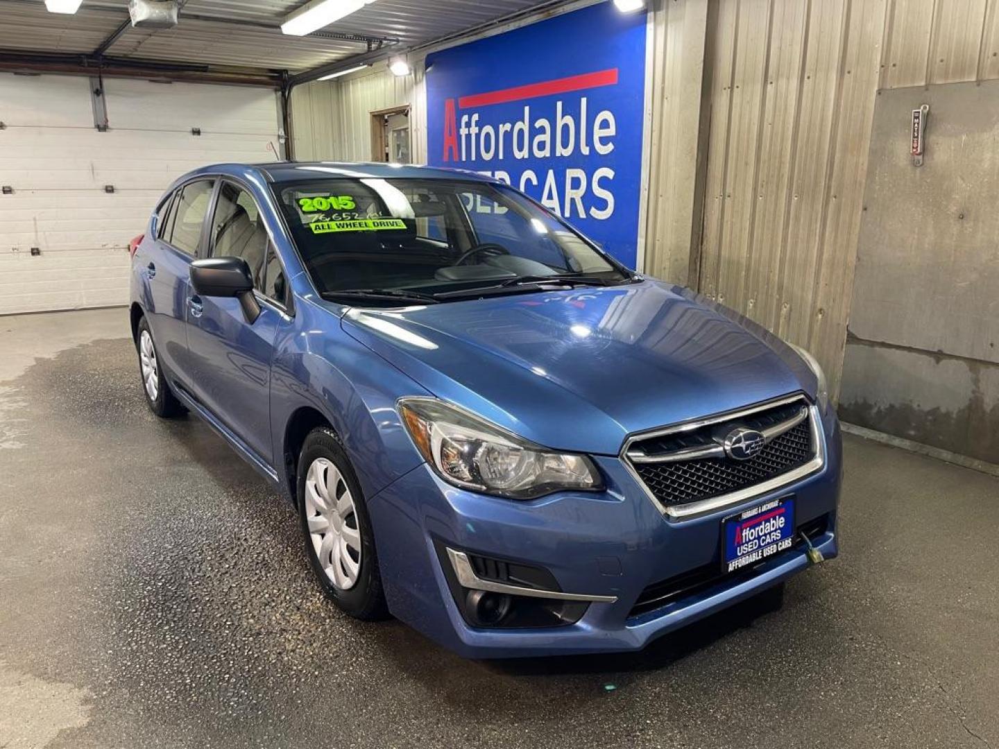 2015 BLUE SUBARU IMPREZA (JF1GPAA60FH) with an 2.0L engine, Continuously Variable transmission, located at 2525 S. Cushman, Fairbanks, AK, 99701, (907) 452-5707, 64.824036, -147.712311 - Photo#0