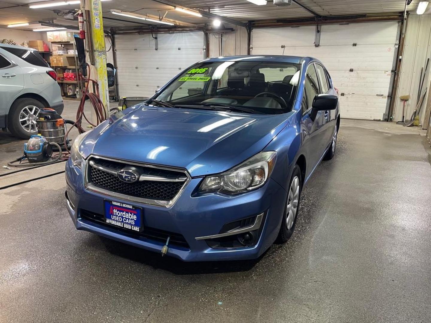 2015 BLUE SUBARU IMPREZA (JF1GPAA60FH) with an 2.0L engine, Continuously Variable transmission, located at 2525 S. Cushman, Fairbanks, AK, 99701, (907) 452-5707, 64.824036, -147.712311 - Photo#1