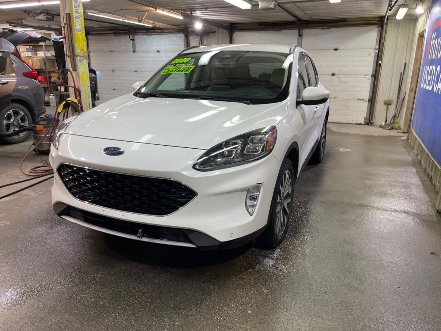 2020 WHITE FORD ESCAPE TITANIUM (1FMCU9J94LU) with an 2.0L engine, Automatic transmission, located at 2525 S. Cushman, Fairbanks, AK, 99701, (907) 452-5707, 64.824036, -147.712311 - Photo#1