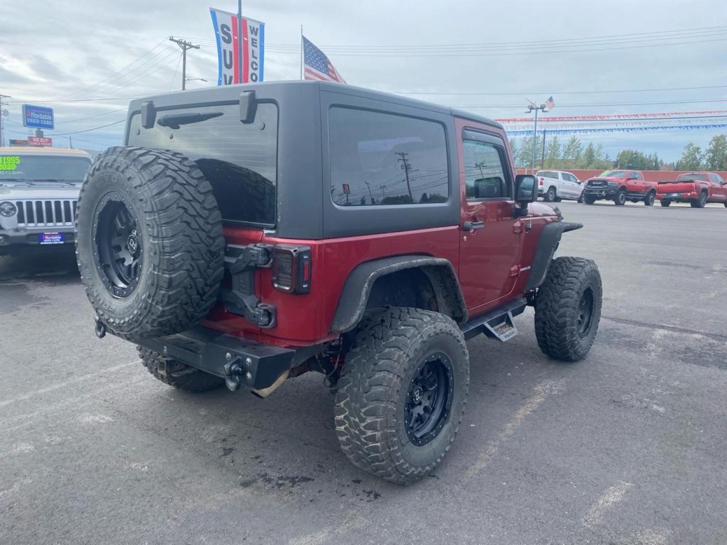 2013 RED JEEP WRANGLER RUBICON (1C4BJWCG5DL) with an 3.6L engine, 5-Speed Manual transmission, located at 2525 S. Cushman, Fairbanks, AK, 99701, (907) 452-5707, 64.824036, -147.712311 - Photo#2