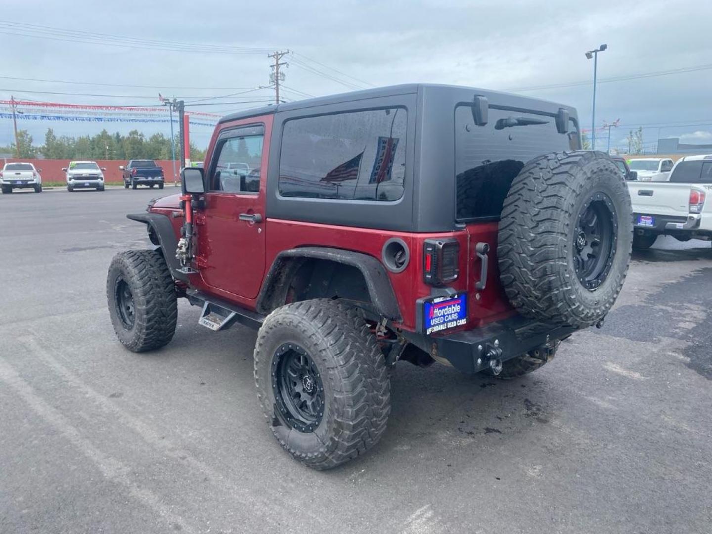 2013 RED JEEP WRANGLER RUBICON (1C4BJWCG5DL) with an 3.6L engine, 5-Speed Manual transmission, located at 2525 S. Cushman, Fairbanks, AK, 99701, (907) 452-5707, 64.824036, -147.712311 - Photo#3