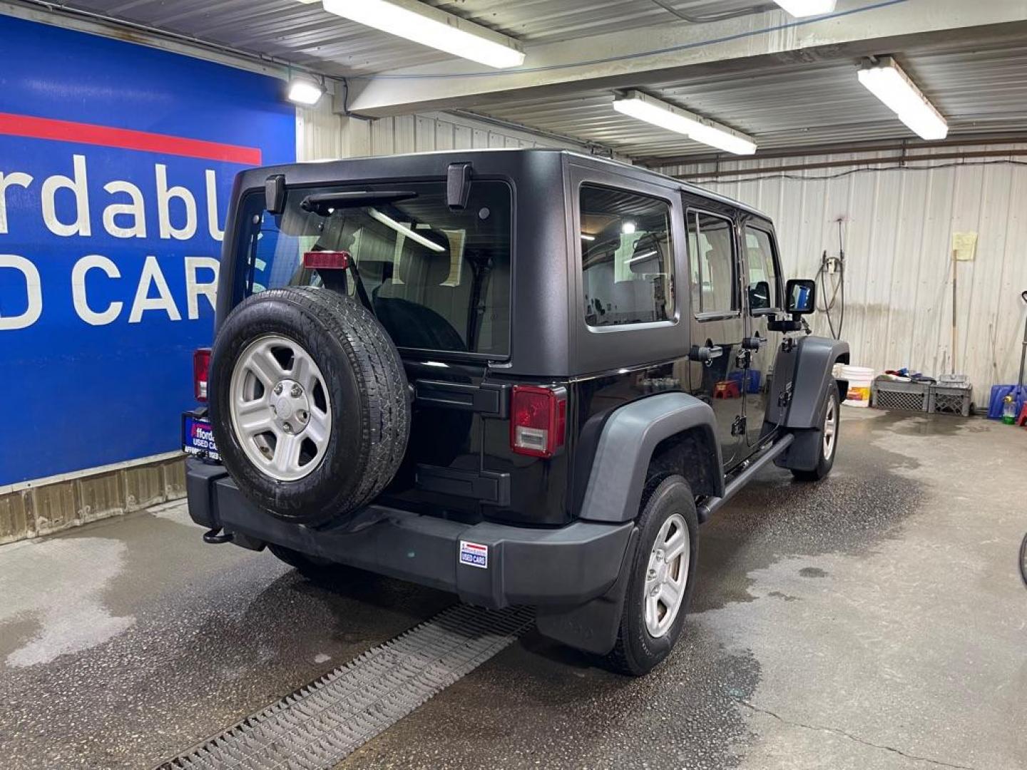 2012 BLACK JEEP WRANGLER UNLIMI SPORT (1C4BJWDG5CL) with an 3.6L engine, Automatic transmission, located at 2525 S. Cushman, Fairbanks, AK, 99701, (907) 452-5707, 64.824036, -147.712311 - Photo#2