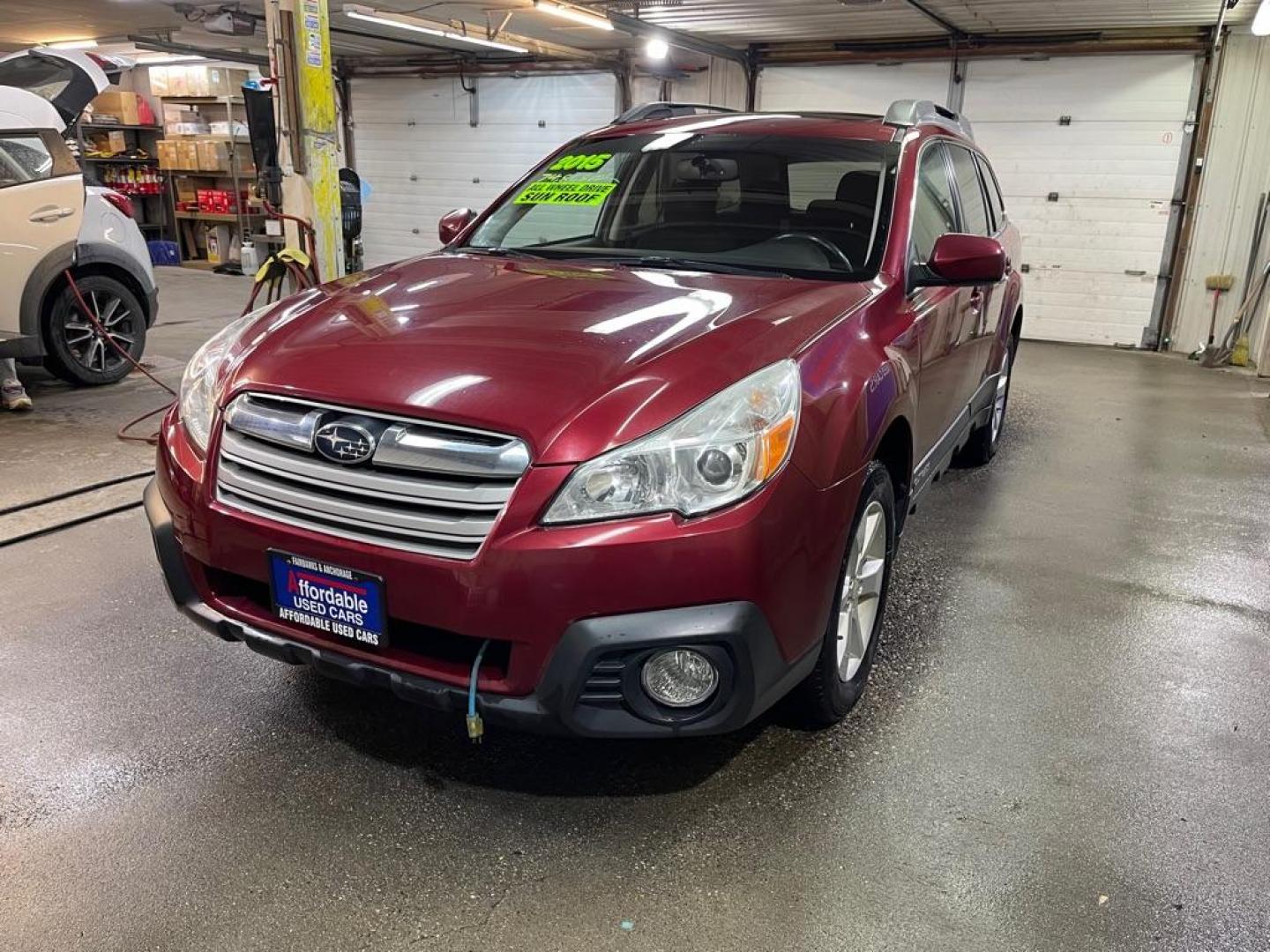 2014 RED SUBARU OUTBACK 2.5I PREMIUM (4S4BRBDC7E3) with an 2.5L engine, Continuously Variable transmission, located at 2525 S. Cushman, Fairbanks, AK, 99701, (907) 452-5707, 64.824036, -147.712311 - Photo#1