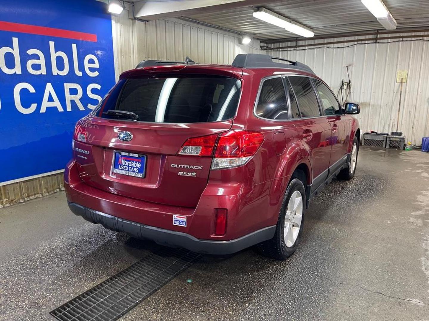 2014 RED SUBARU OUTBACK 2.5I PREMIUM (4S4BRBDC7E3) with an 2.5L engine, Continuously Variable transmission, located at 2525 S. Cushman, Fairbanks, AK, 99701, (907) 452-5707, 64.824036, -147.712311 - Photo#2