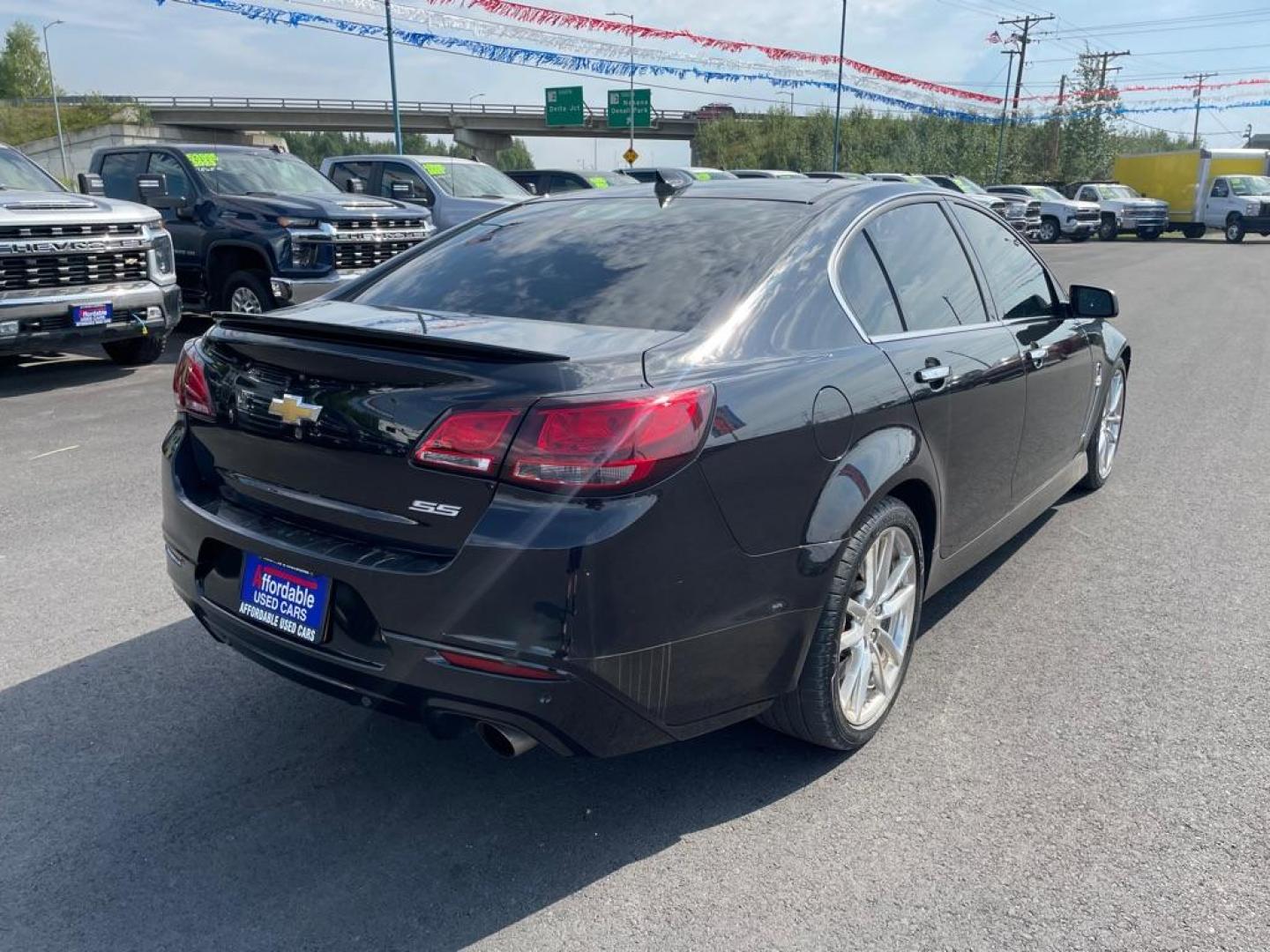 2015 BLACK CHEVROLET SS (6G3F15RW6FL) with an 6.2L engine, Automatic transmission, located at 2525 S. Cushman, Fairbanks, AK, 99701, (907) 452-5707, 64.824036, -147.712311 - Photo#3