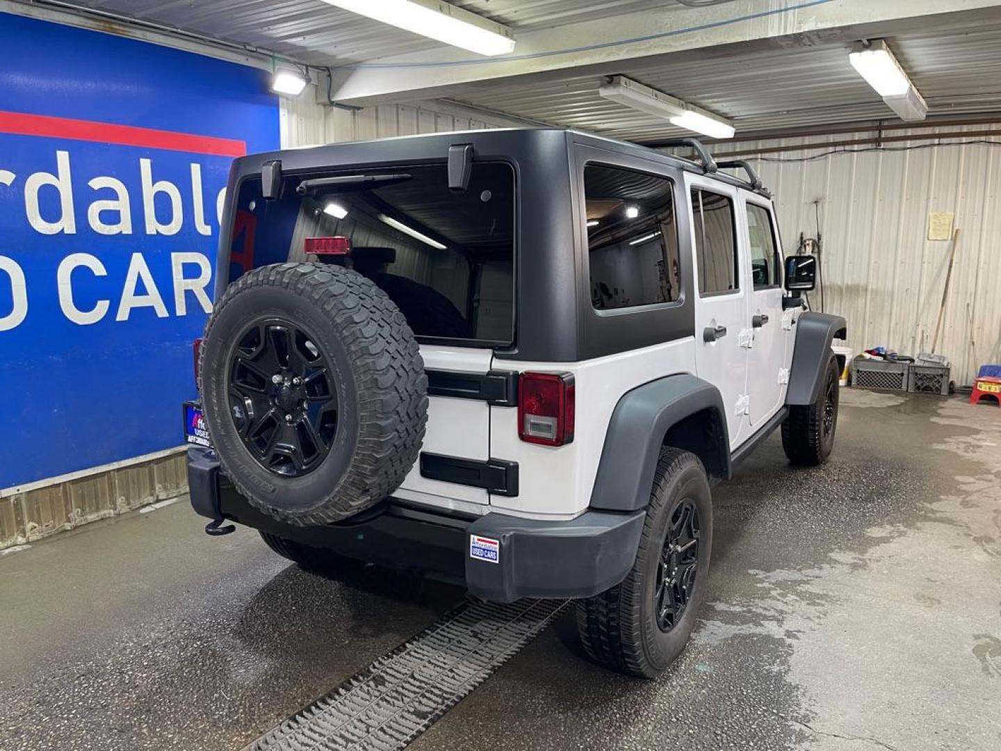 2017 WHITE JEEP WRANGLER UNLIMI SPORT (1C4BJWDG5HL) with an 3.6L engine, Automatic transmission, located at 2525 S. Cushman, Fairbanks, AK, 99701, (907) 452-5707, 64.824036, -147.712311 - Photo#2