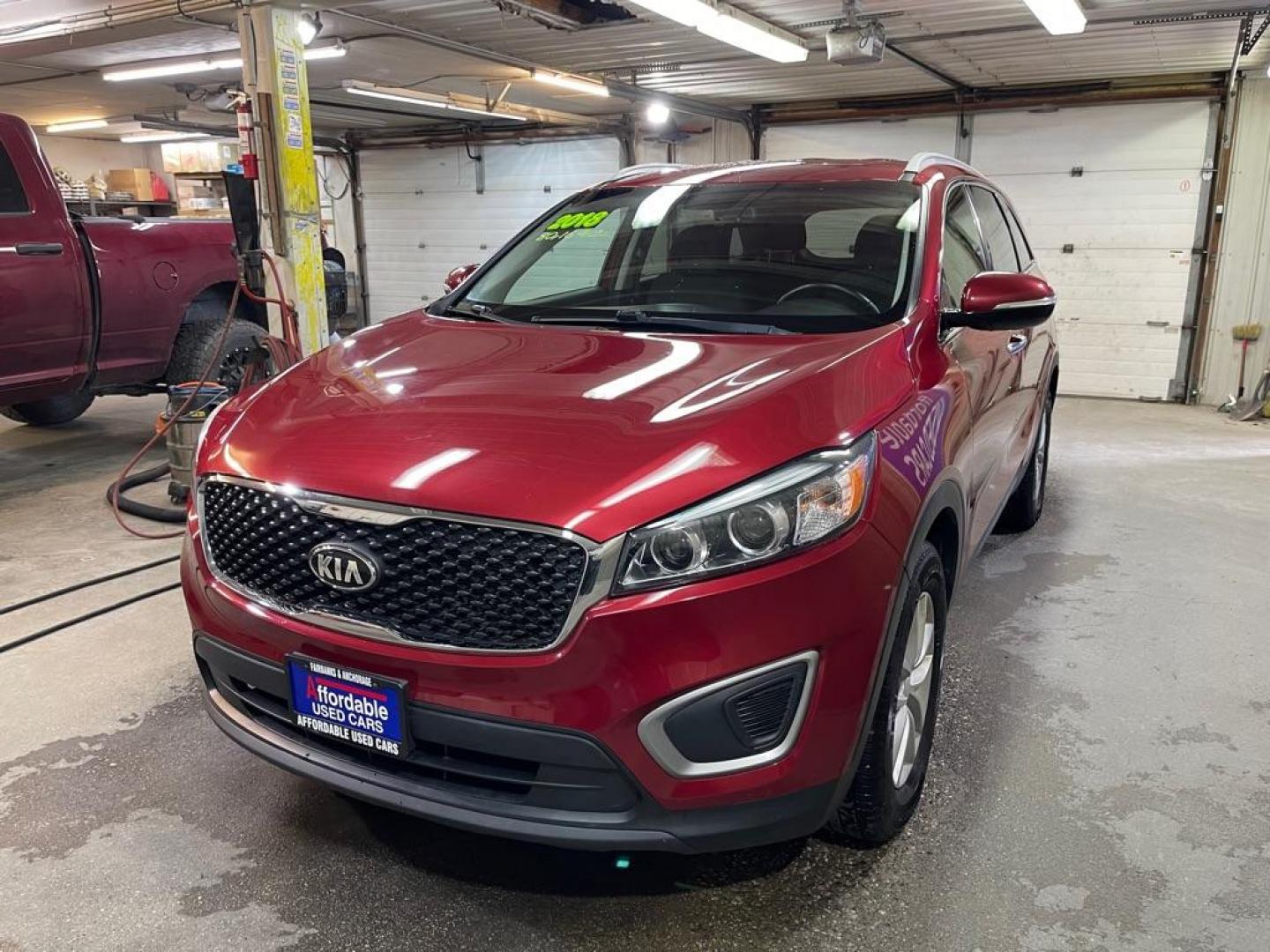 2018 RED KIA SORENTO LX (5XYPG4A32JG) with an 2.4L engine, Automatic transmission, located at 2525 S. Cushman, Fairbanks, AK, 99701, (907) 452-5707, 64.824036, -147.712311 - Photo#1