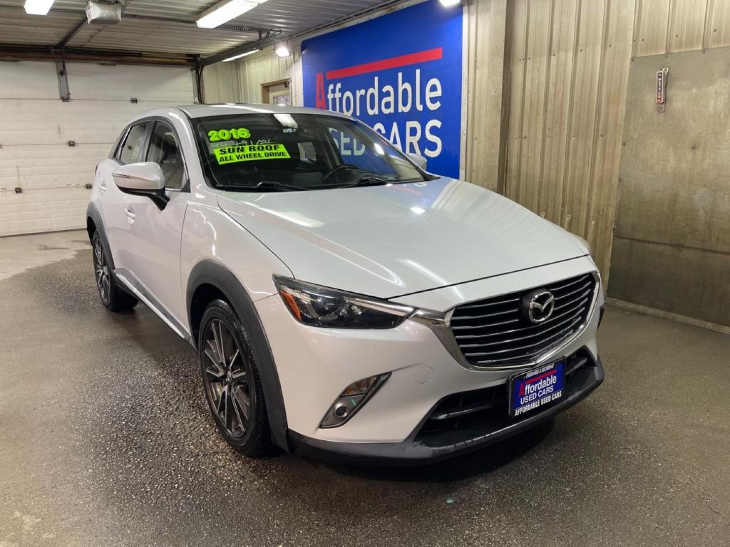 2016 SILVER MAZDA CX-3 GRAND TOURING (JM1DKBD7XG0) with an 2.0L engine, Automatic transmission, located at 2525 S. Cushman, Fairbanks, AK, 99701, (907) 452-5707, 64.824036, -147.712311 - Photo#0