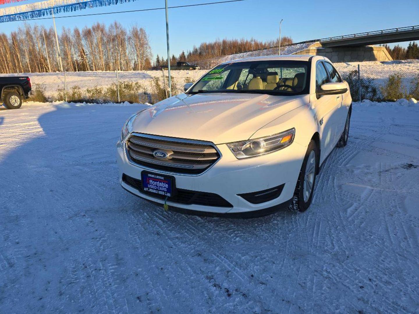 2015 WHITE FORD TAURUS SEL (1FAHP2H82FG) with an 3.5L engine, Automatic transmission, located at 2525 S. Cushman, Fairbanks, AK, 99701, (907) 452-5707, 64.824036, -147.712311 - Photo#1