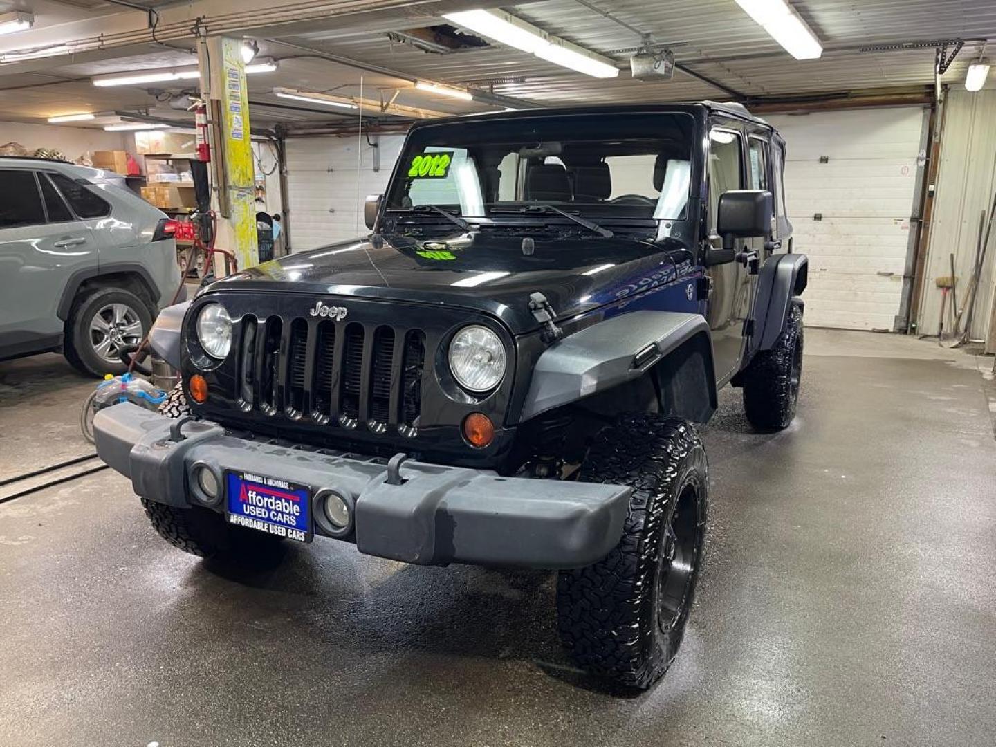 2012 BLACK JEEP WRANGLER UNLIMI SPORT (1C4BJWDG0CL) with an 3.6L engine, Automatic transmission, located at 2525 S. Cushman, Fairbanks, AK, 99701, (907) 452-5707, 64.824036, -147.712311 - Photo#1