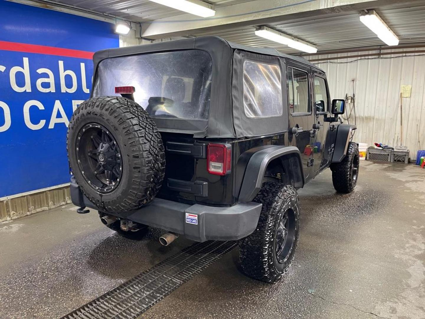 2012 BLACK JEEP WRANGLER UNLIMI SPORT (1C4BJWDG0CL) with an 3.6L engine, Automatic transmission, located at 2525 S. Cushman, Fairbanks, AK, 99701, (907) 452-5707, 64.824036, -147.712311 - Photo#2