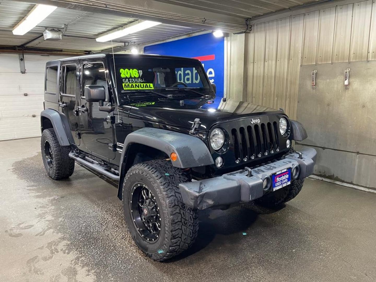 2016 BLACK JEEP WRANGLER UNLIMI SPORT (1C4BJWDG3GL) with an 3.6L engine, 5-Speed Manual transmission, located at 2525 S. Cushman, Fairbanks, AK, 99701, (907) 452-5707, 64.824036, -147.712311 - Photo#0