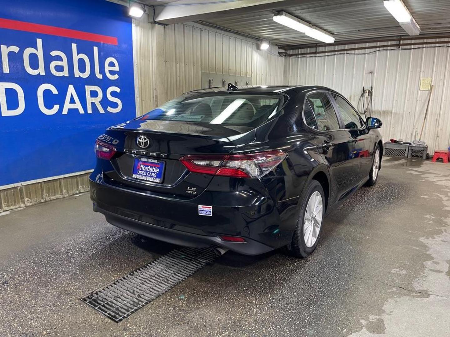 2022 BLACK TOYOTA CAMRY LE (4T1C11BK2NU) with an 2.5L engine, Automatic transmission, located at 2525 S. Cushman, Fairbanks, AK, 99701, (907) 452-5707, 64.824036, -147.712311 - Photo#2