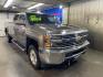 2015 GREEN CHEVROLET SILVERADO 2500 HEAVY DUTY LT (1GC1KVE8XFF) with an 6.6L engine, Automatic transmission, located at 2525 S. Cushman, Fairbanks, AK, 99701, (907) 452-5707, 64.824036, -147.712311 - Photo#0