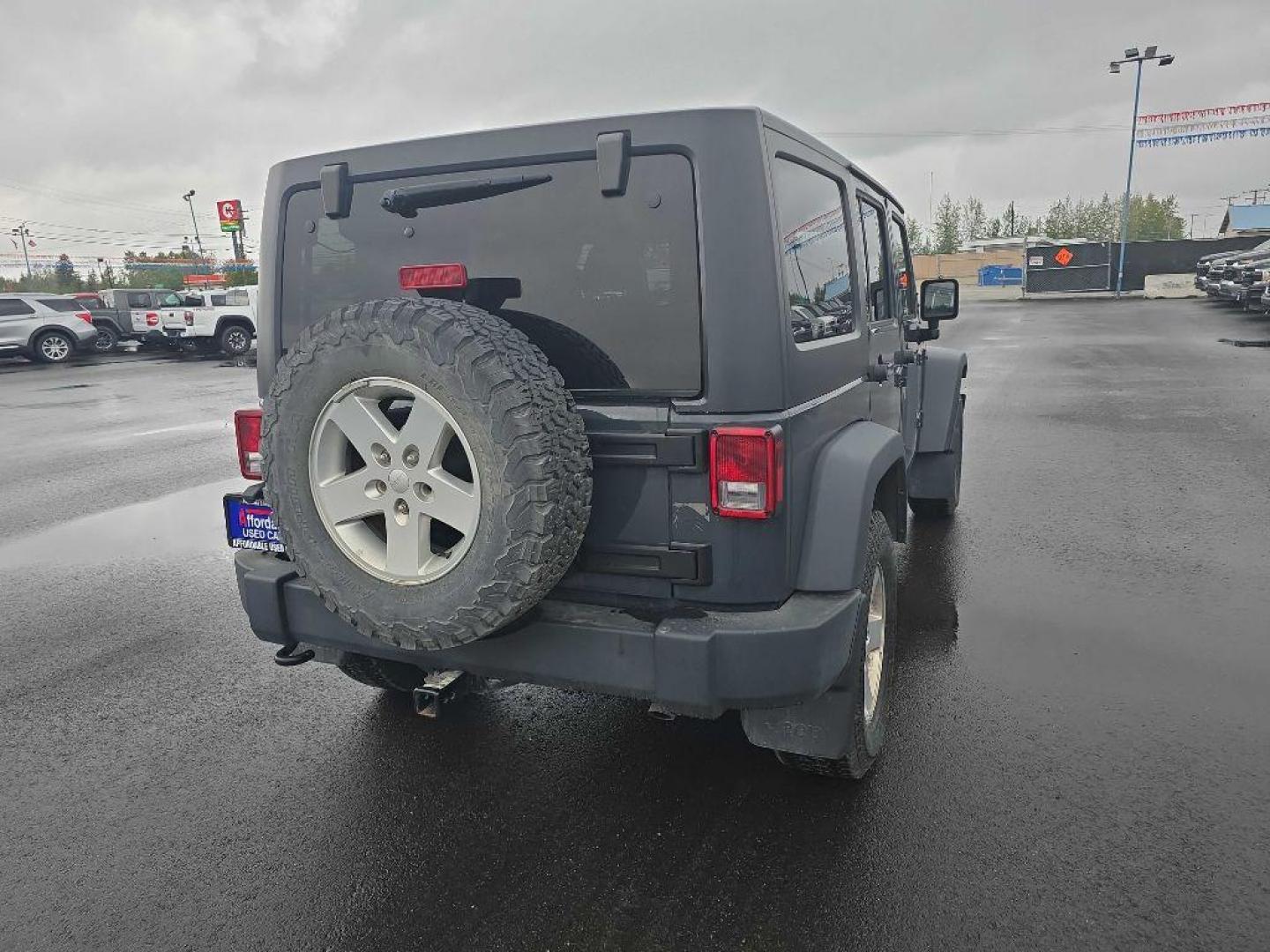 2017 GRAY JEEP WRANGLER UNLIMI SPORT (1C4BJWDG1HL) with an 3.6L engine, Automatic transmission, located at 2525 S. Cushman, Fairbanks, AK, 99701, (907) 452-5707, 64.824036, -147.712311 - Photo#2