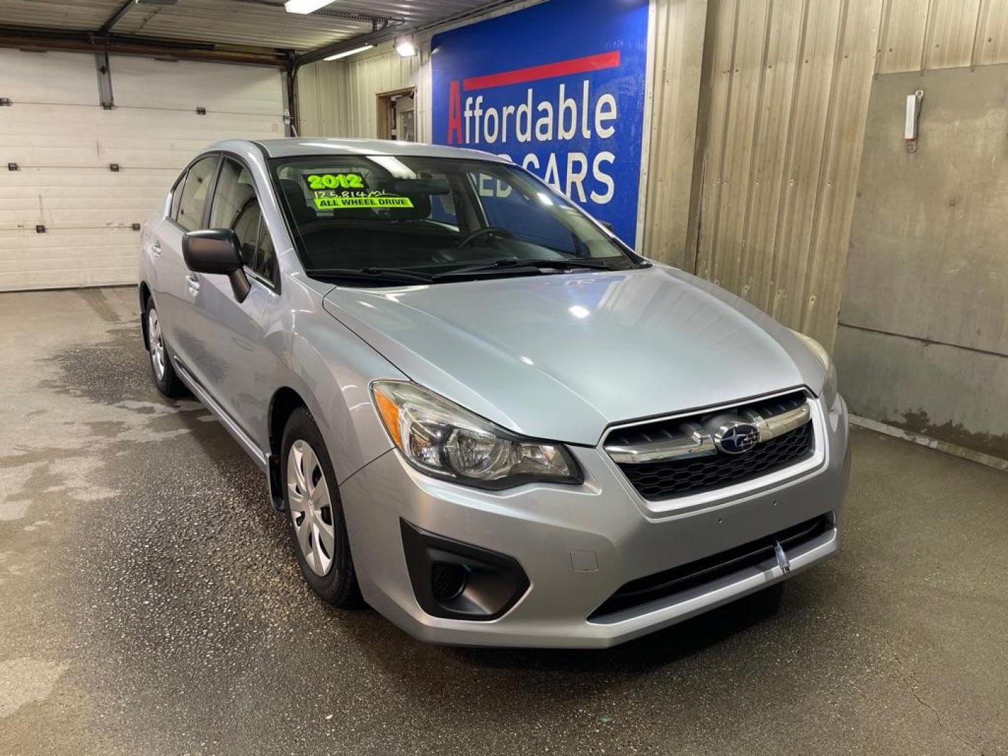 2012 GREY SUBARU IMPREZA (JF1GJAA63CH) with an 2.0L engine, Continuously Variable transmission, located at 2525 S. Cushman, Fairbanks, AK, 99701, (907) 452-5707, 64.824036, -147.712311 - Photo#0