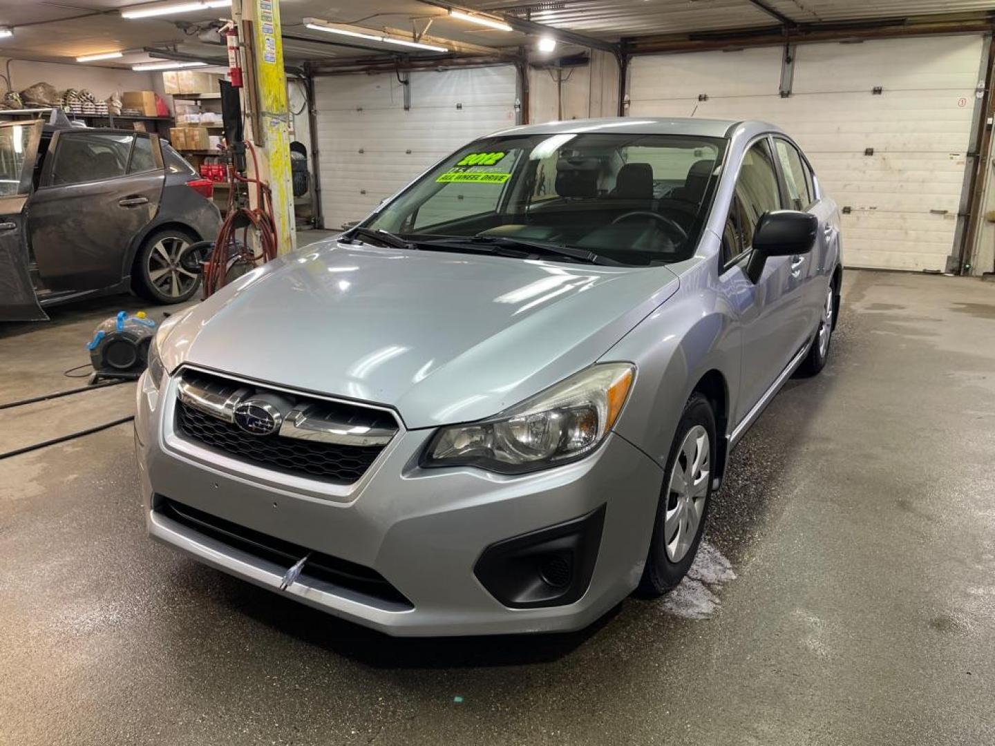 2012 GREY SUBARU IMPREZA (JF1GJAA63CH) with an 2.0L engine, Continuously Variable transmission, located at 2525 S. Cushman, Fairbanks, AK, 99701, (907) 452-5707, 64.824036, -147.712311 - Photo#1