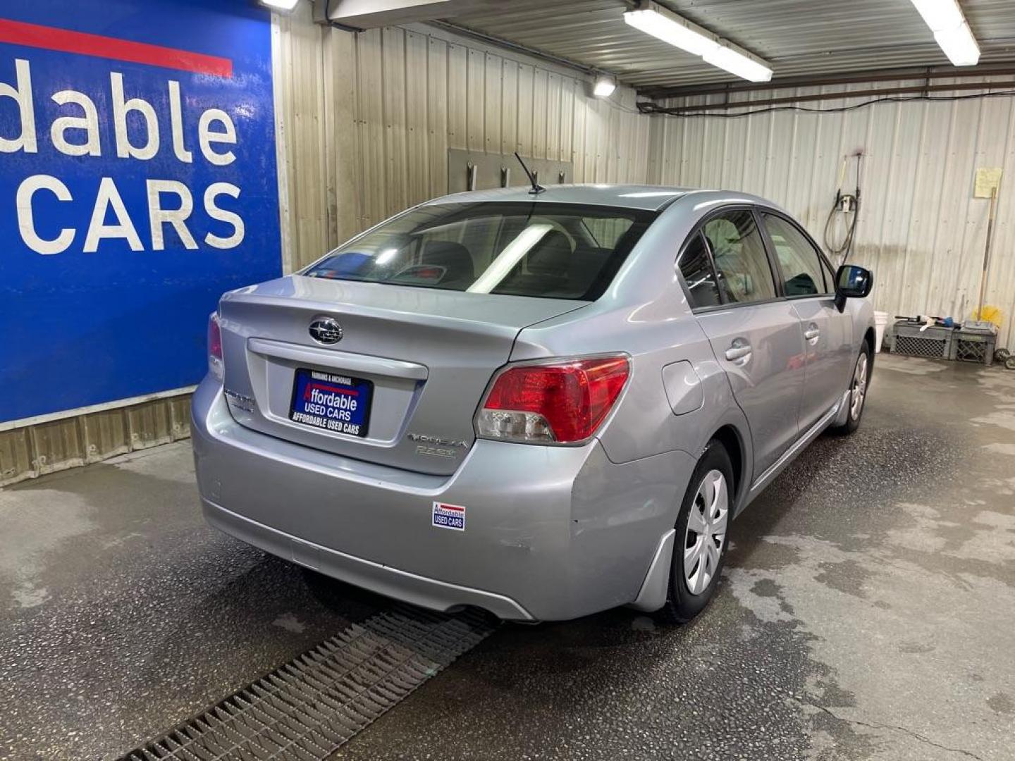 2012 GREY SUBARU IMPREZA (JF1GJAA63CH) with an 2.0L engine, Continuously Variable transmission, located at 2525 S. Cushman, Fairbanks, AK, 99701, (907) 452-5707, 64.824036, -147.712311 - Photo#2