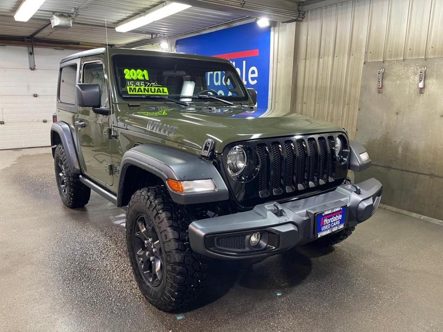 2021 GREEN JEEP WRANGLER SPORT (1C4GJXAG8MW) with an 3.6L engine, 8-Speed Manual transmission, located at 2525 S. Cushman, Fairbanks, AK, 99701, (907) 452-5707, 64.824036, -147.712311 - Photo#0