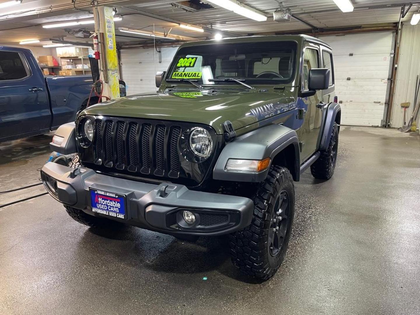 2021 GREEN JEEP WRANGLER SPORT (1C4GJXAG8MW) with an 3.6L engine, 8-Speed Manual transmission, located at 2525 S. Cushman, Fairbanks, AK, 99701, (907) 452-5707, 64.824036, -147.712311 - Photo#1