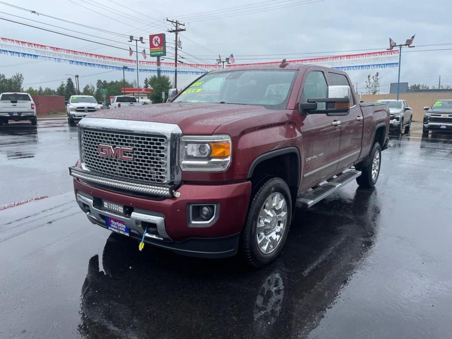 2015 MAROON GMC SIERRA 2500 DENALI (1GT120EG8FF) with an 6.0L engine, Automatic transmission, located at 2525 S. Cushman, Fairbanks, AK, 99701, (907) 452-5707, 64.824036, -147.712311 - Photo#1