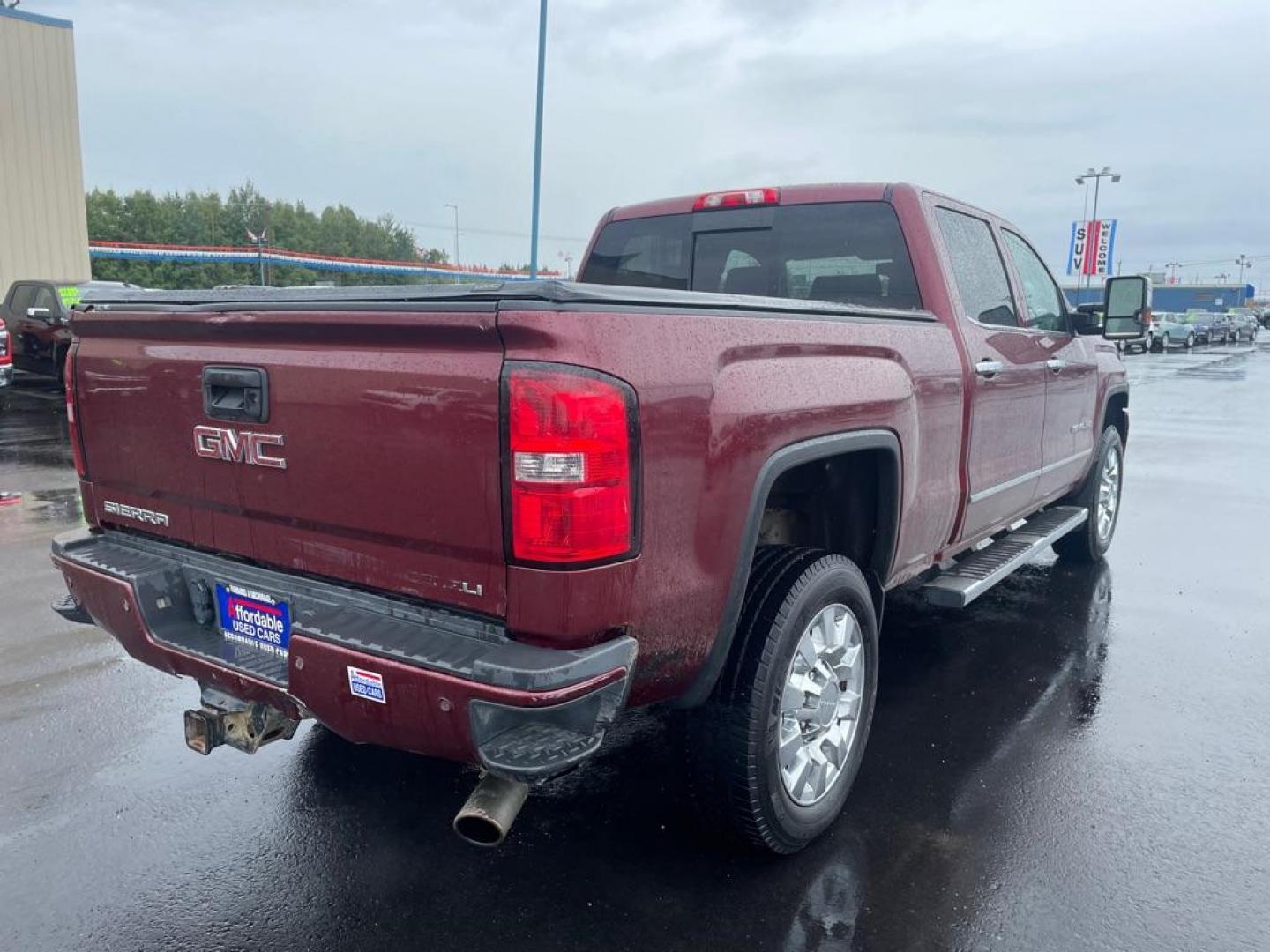 2015 MAROON GMC SIERRA 2500 DENALI (1GT120EG8FF) with an 6.0L engine, Automatic transmission, located at 2525 S. Cushman, Fairbanks, AK, 99701, (907) 452-5707, 64.824036, -147.712311 - Photo#3