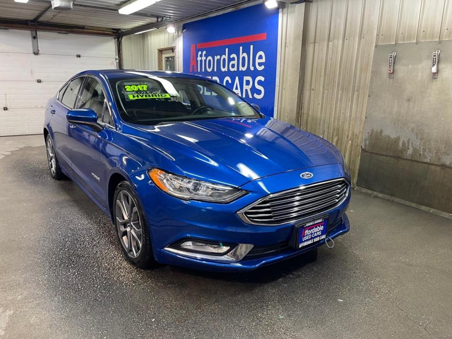 2017 BLUE FORD FUSION SE HYBRID (3FA6P0LU2HR) with an 2.0L engine, Continuously Variable transmission, located at 2525 S. Cushman, Fairbanks, AK, 99701, (907) 452-5707, 64.824036, -147.712311 - Photo#0