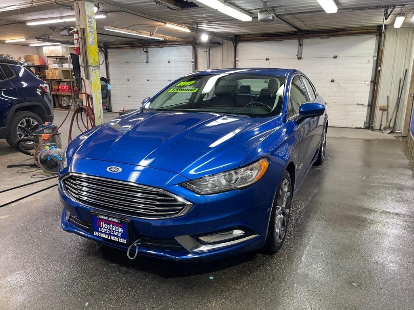 2017 BLUE FORD FUSION SE HYBRID (3FA6P0LU2HR) with an 2.0L engine, Continuously Variable transmission, located at 2525 S. Cushman, Fairbanks, AK, 99701, (907) 452-5707, 64.824036, -147.712311 - Photo#1