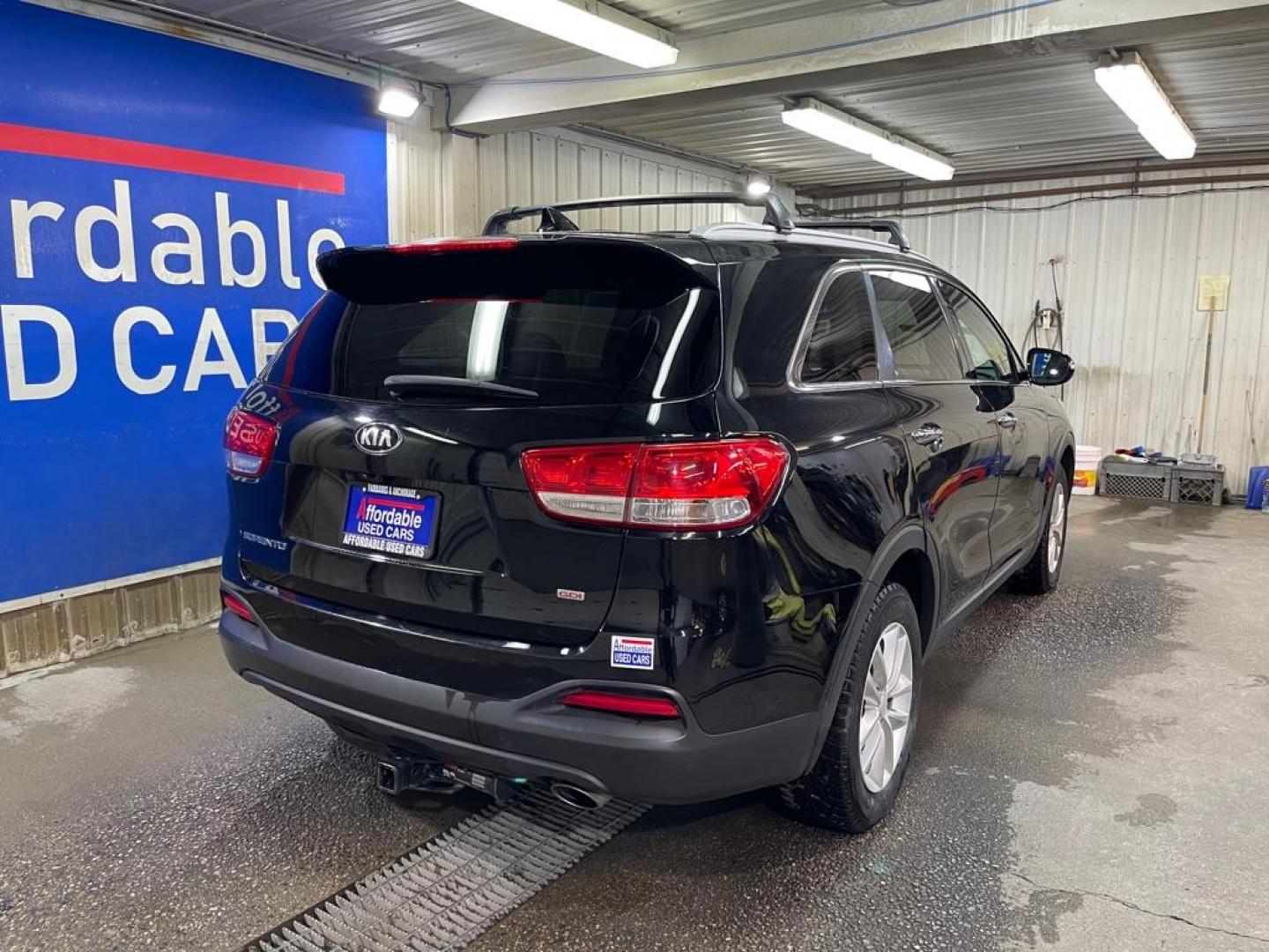 2018 BLACK KIA SORENTO LX (5XYPG4A30JG) with an 2.4L engine, Automatic transmission, located at 2525 S. Cushman, Fairbanks, AK, 99701, (907) 452-5707, 64.824036, -147.712311 - Photo#2