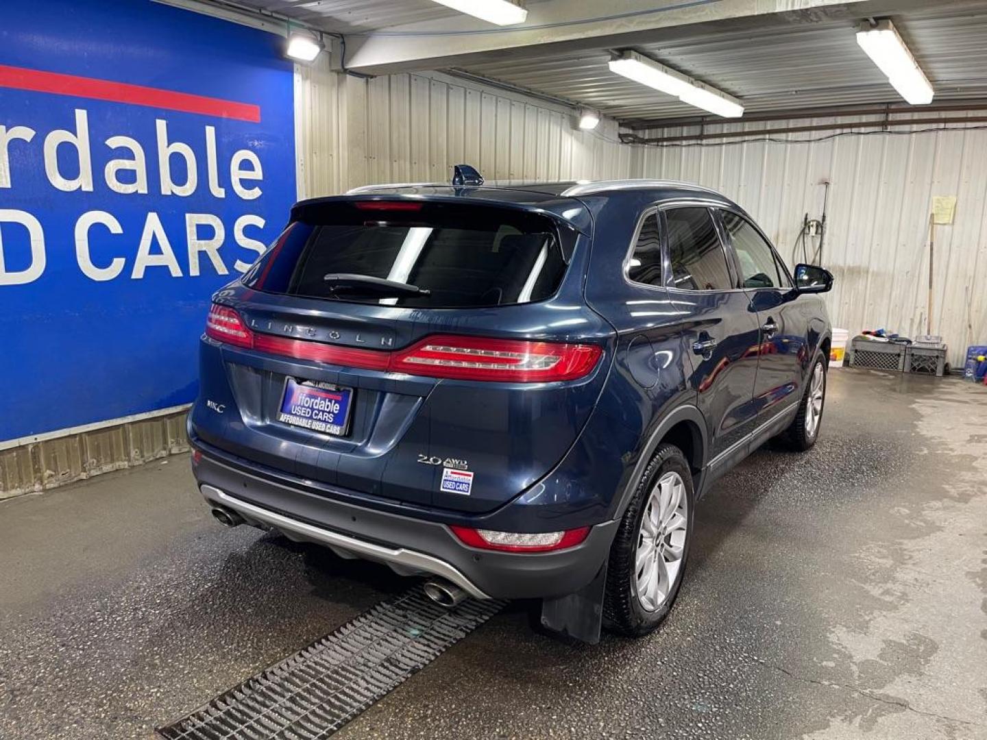 2015 BLUE LINCOLN MKC (5LMCJ2A96FU) with an 2.0L engine, Automatic transmission, located at 2525 S. Cushman, Fairbanks, AK, 99701, (907) 452-5707, 64.824036, -147.712311 - Photo#2