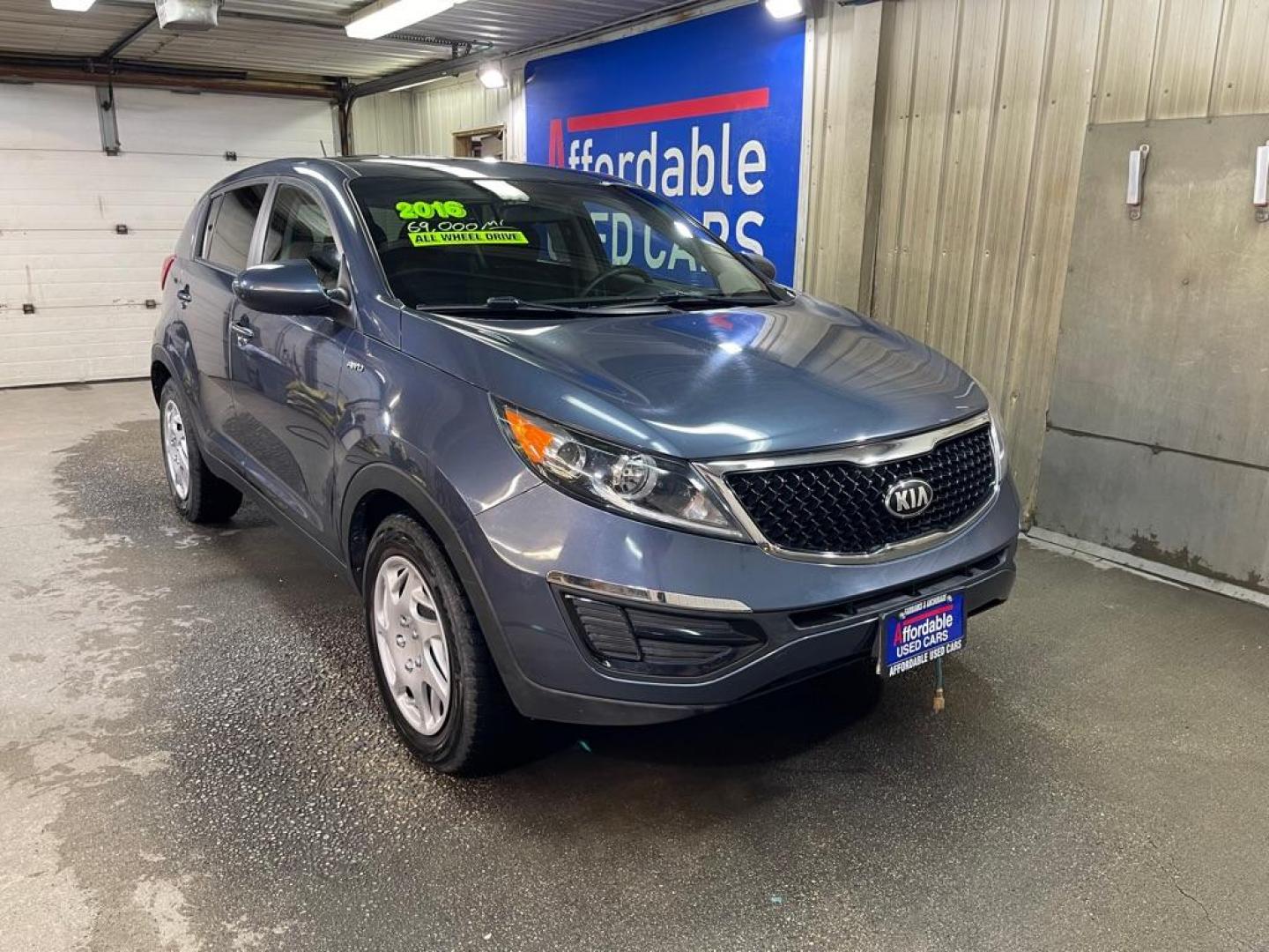2016 BLUE KIA SPORTAGE LX (KNDPBCAC9G7) with an 2.4L engine, Automatic transmission, located at 2525 S. Cushman, Fairbanks, AK, 99701, (907) 452-5707, 64.824036, -147.712311 - Photo#0