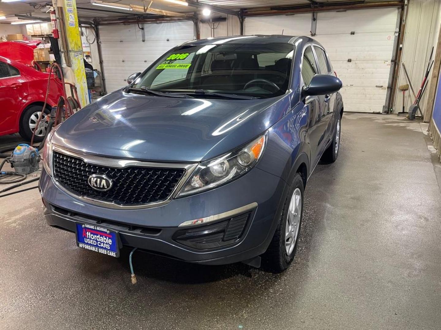 2016 BLUE KIA SPORTAGE LX (KNDPBCAC9G7) with an 2.4L engine, Automatic transmission, located at 2525 S. Cushman, Fairbanks, AK, 99701, (907) 452-5707, 64.824036, -147.712311 - Photo#1