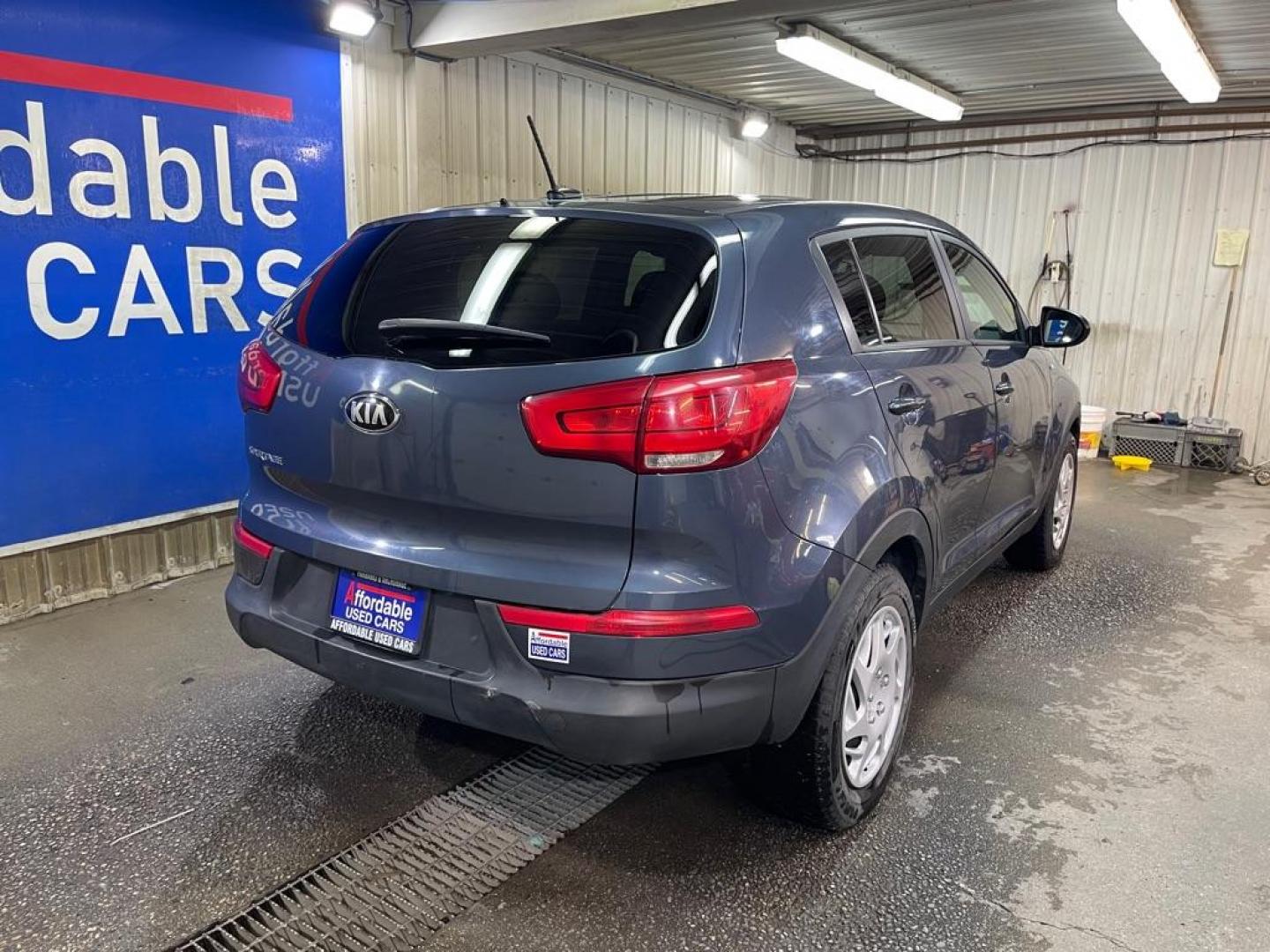 2016 BLUE KIA SPORTAGE LX (KNDPBCAC9G7) with an 2.4L engine, Automatic transmission, located at 2525 S. Cushman, Fairbanks, AK, 99701, (907) 452-5707, 64.824036, -147.712311 - Photo#2