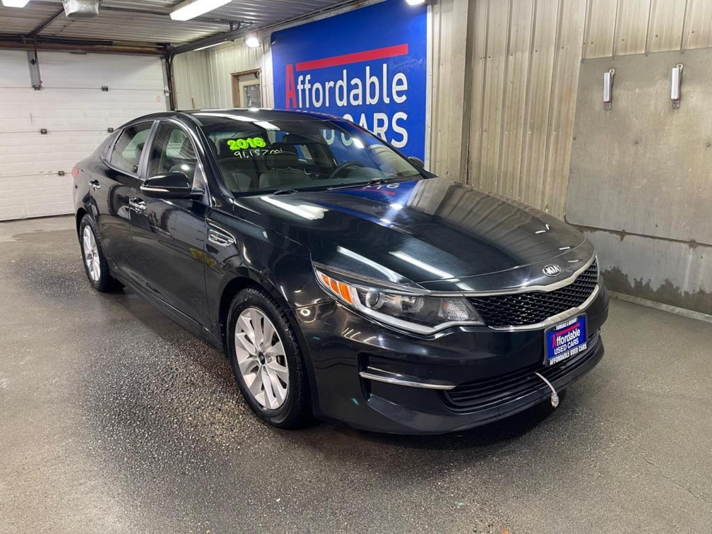 2016 BLACK KIA OPTIMA LX (5XXGT4L33GG) with an 2.4L engine, Automatic transmission, located at 2525 S. Cushman, Fairbanks, AK, 99701, (907) 452-5707, 64.824036, -147.712311 - Photo#0