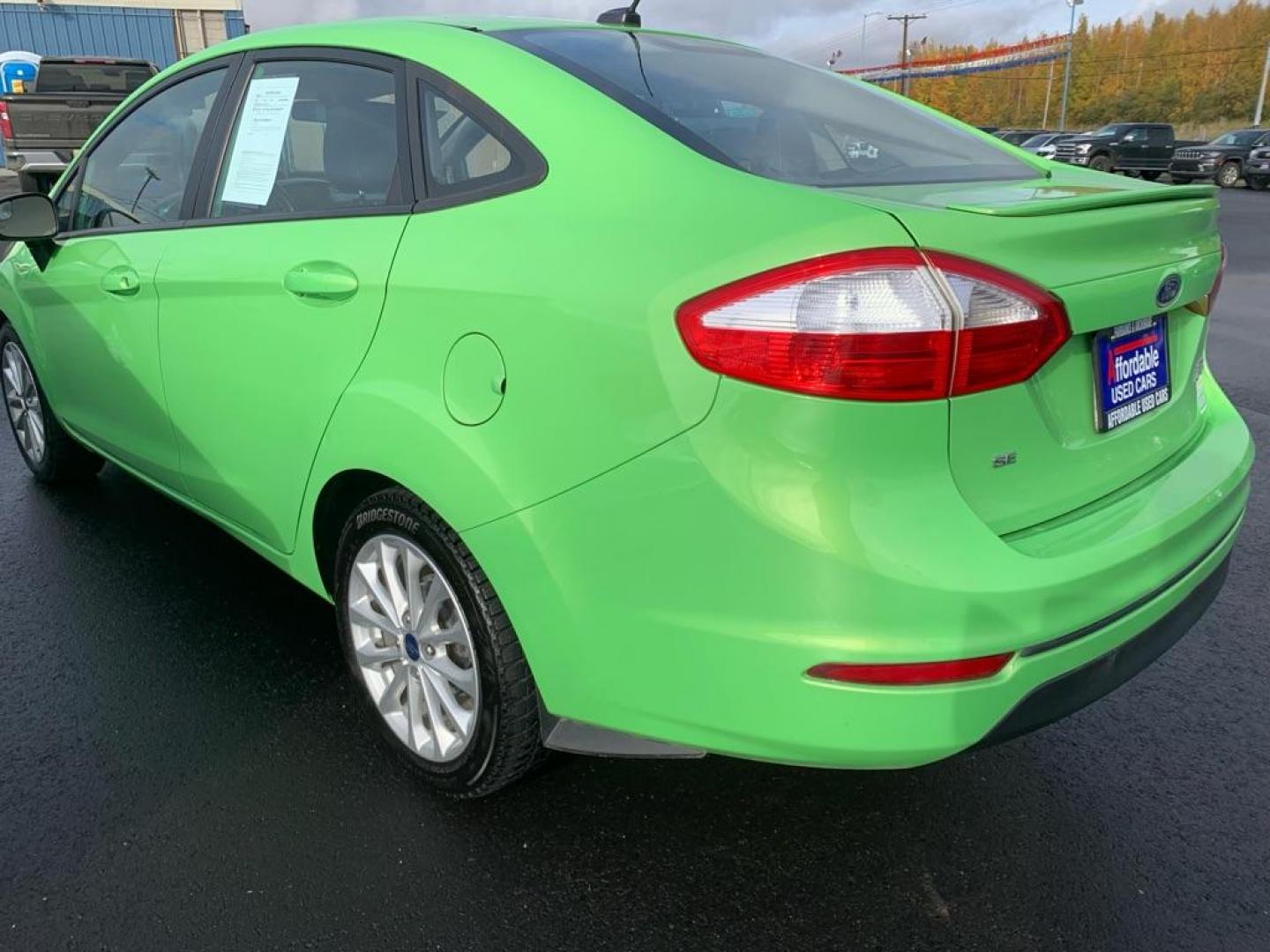 2014 GREEN FORD FIESTA SE (3FADP4BJ0EM) with an 1.6L engine, Automatic transmission, located at 2525 S. Cushman, Fairbanks, AK, 99701, (907) 452-5707, 64.824036, -147.712311 - Photo#2