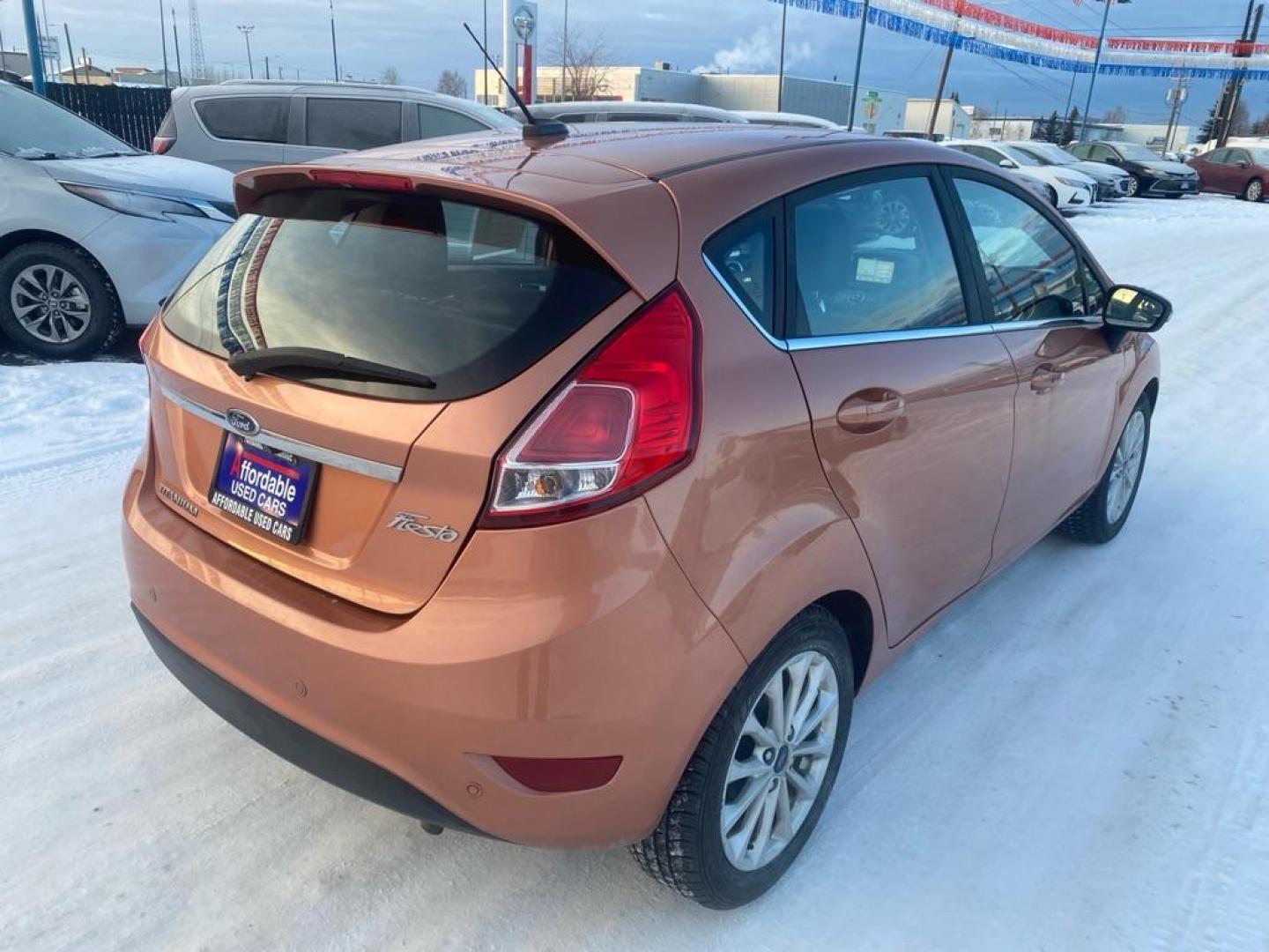 2017 COPPER FORD FIESTA TITANIUM (3FADP4FJ9HM) with an 1.6L engine, Automatic transmission, located at 2525 S. Cushman, Fairbanks, AK, 99701, (907) 452-5707, 64.824036, -147.712311 - Photo#2