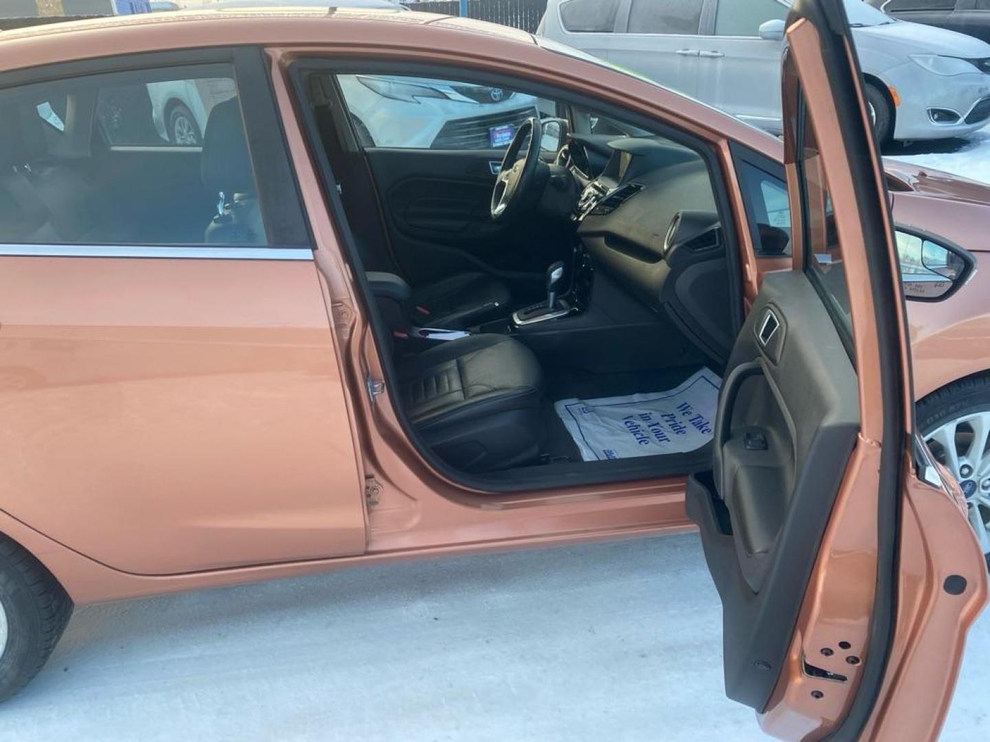 2017 COPPER FORD FIESTA TITANIUM (3FADP4FJ9HM) with an 1.6L engine, Automatic transmission, located at 2525 S. Cushman, Fairbanks, AK, 99701, (907) 452-5707, 64.824036, -147.712311 - Photo#4