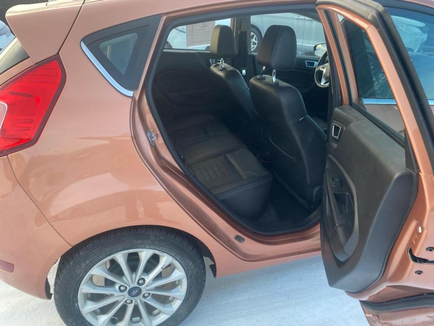 2017 COPPER FORD FIESTA TITANIUM (3FADP4FJ9HM) with an 1.6L engine, Automatic transmission, located at 2525 S. Cushman, Fairbanks, AK, 99701, (907) 452-5707, 64.824036, -147.712311 - Photo#5