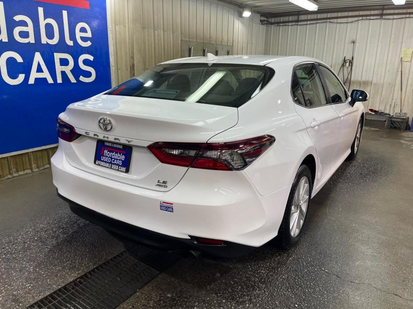 2023 WHITE TOYOTA CAMRY AWD LE LE (4T1C11BK9PU) with an 2.5L engine, Automatic transmission, located at 2525 S. Cushman, Fairbanks, AK, 99701, (907) 452-5707, 64.824036, -147.712311 - Photo#2