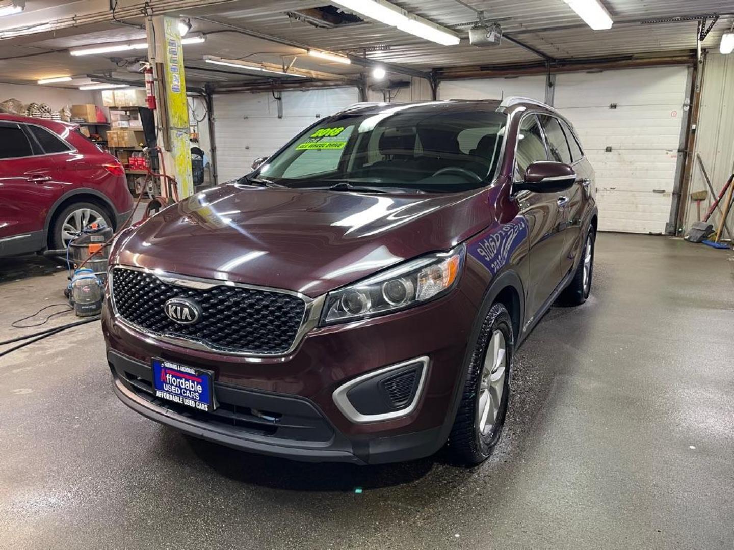 2018 MAROON KIA SORENTO LX (5XYPGDA52JG) with an 3.3L engine, Automatic transmission, located at 2525 S. Cushman, Fairbanks, AK, 99701, (907) 452-5707, 64.824036, -147.712311 - Photo#1