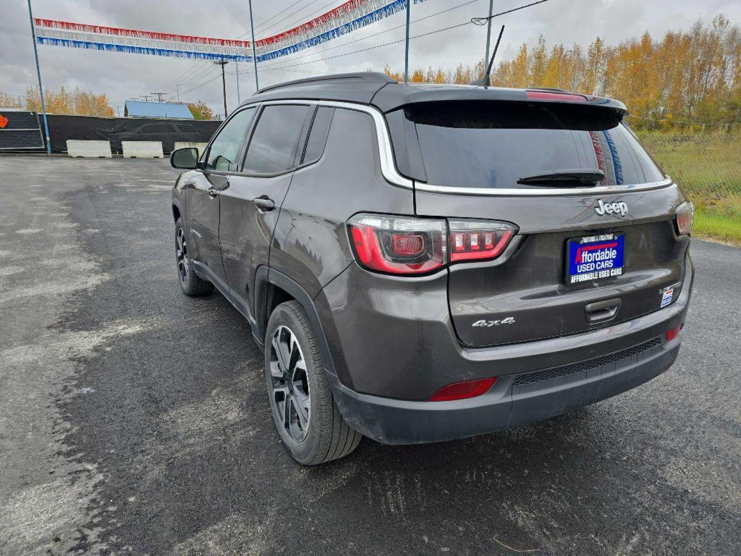 2022 BLACK JEEP COMPASS LIMITED (3C4NJDCBXNT) with an 2.4L engine, Automatic transmission, located at 2525 S. Cushman, Fairbanks, AK, 99701, (907) 452-5707, 64.824036, -147.712311 - Photo#4