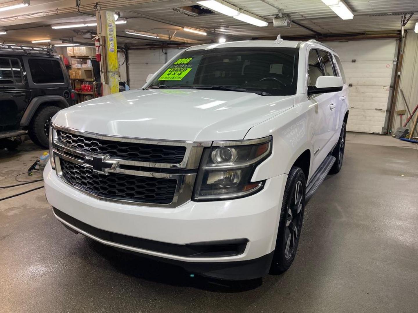 2018 WHITE CHEVROLET TAHOE 1500 LT (1GNSKBKC5JR) with an 5.3L engine, Automatic transmission, located at 2525 S. Cushman, Fairbanks, AK, 99701, (907) 452-5707, 64.824036, -147.712311 - Photo#1