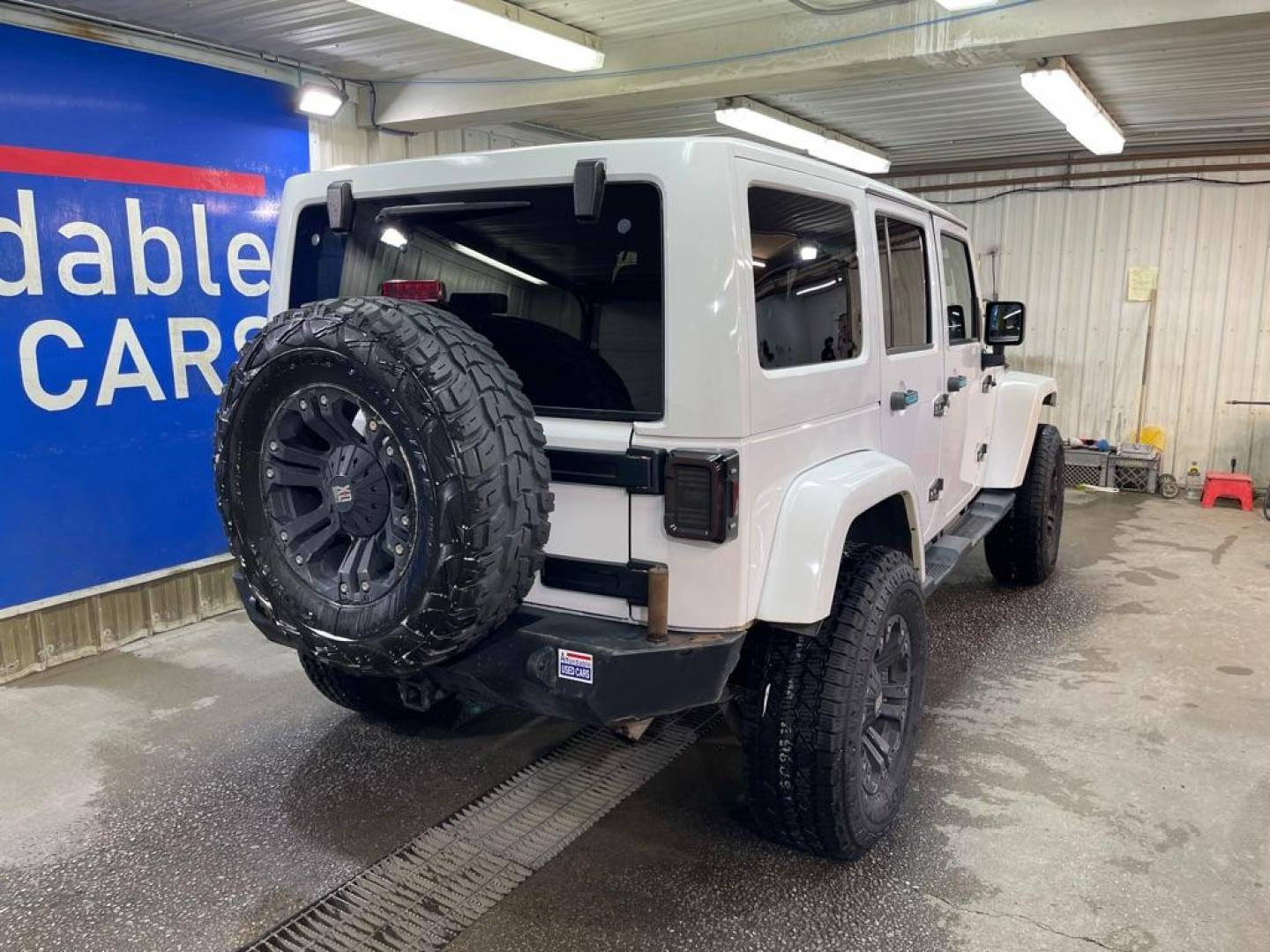 2013 WHITE JEEP WRANGLER UNLIMI SAHARA (1C4BJWEG2DL) with an 3.6L engine, Automatic transmission, located at 2525 S. Cushman, Fairbanks, AK, 99701, (907) 452-5707, 64.824036, -147.712311 - Photo#2