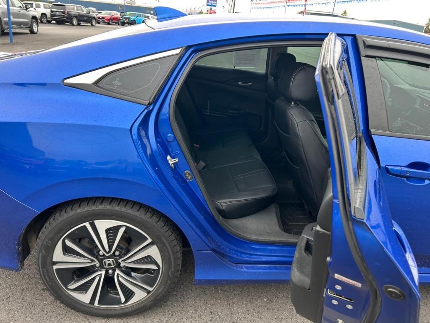 2017 BLUE HONDA CIVIC EX-T (2HGFC1E30HH) with an 1.5L engine, 6-Speed Manual transmission, located at 2525 S. Cushman, Fairbanks, AK, 99701, (907) 452-5707, 64.824036, -147.712311 - Photo#5