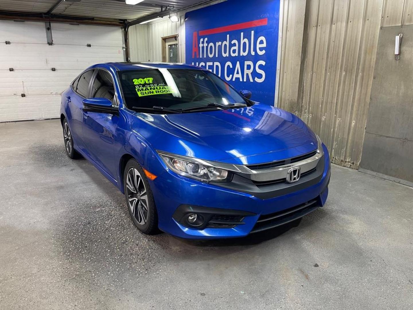 2017 BLUE HONDA CIVIC EX (2HGFC1E30HH) with an 1.5L engine, 6-Speed Manual transmission, located at 2525 S. Cushman, Fairbanks, AK, 99701, (907) 452-5707, 64.824036, -147.712311 - Photo#0