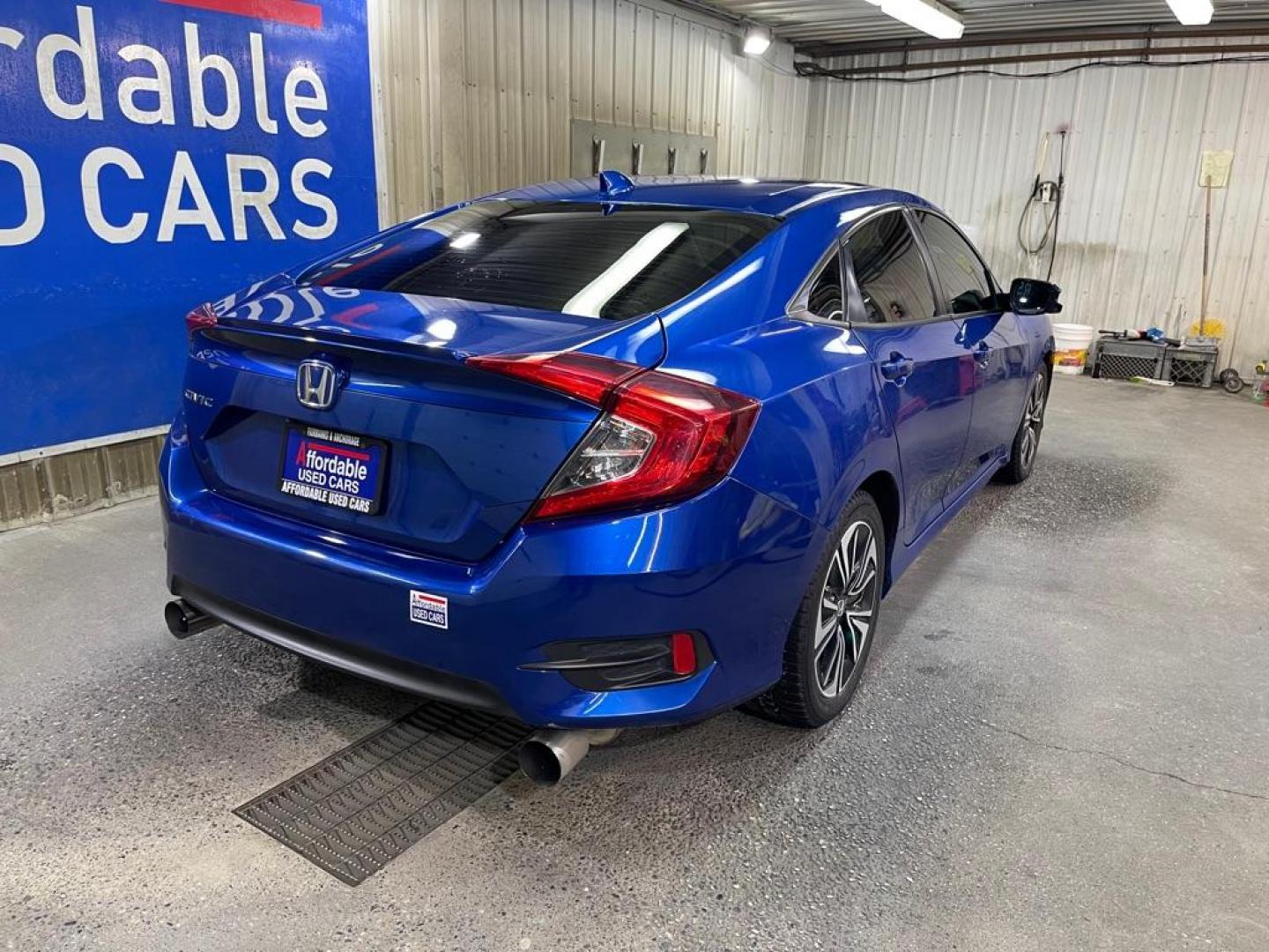 2017 BLUE HONDA CIVIC EX (2HGFC1E30HH) with an 1.5L engine, 6-Speed Manual transmission, located at 2525 S. Cushman, Fairbanks, AK, 99701, (907) 452-5707, 64.824036, -147.712311 - Photo#2