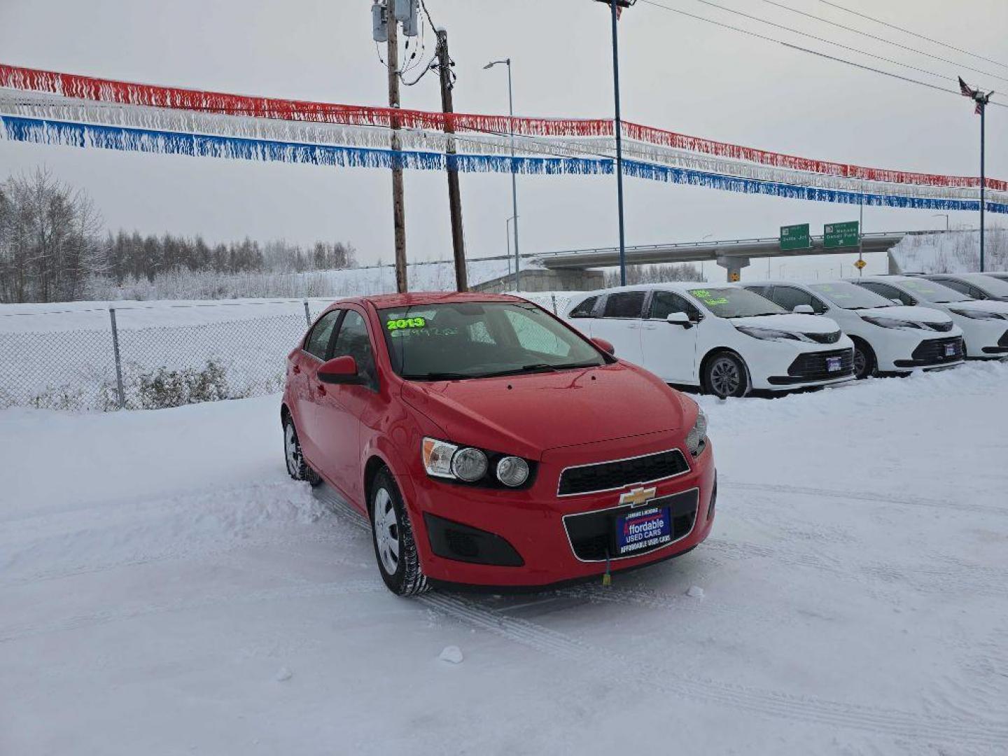 2013 RED CHEVROLET SONIC LT (1G1JC5SH4D4) with an 1.8L engine, Automatic transmission, located at 2525 S. Cushman, Fairbanks, AK, 99701, (907) 452-5707, 64.824036, -147.712311 - Photo#1